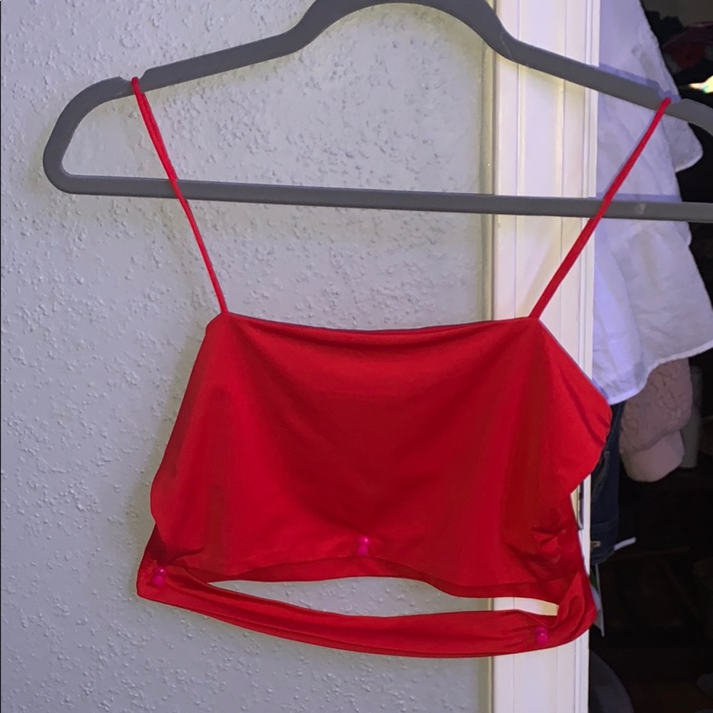 red cropped tank with cutout